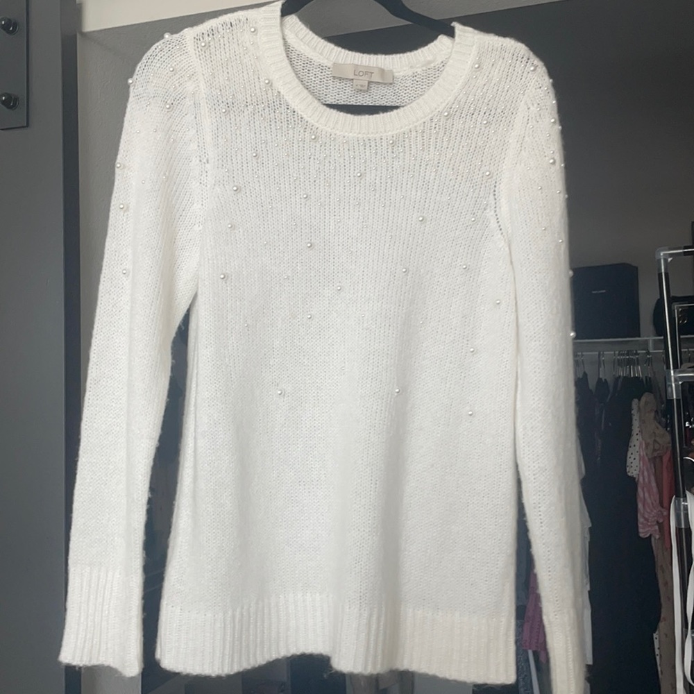 White sweater with pearl detail